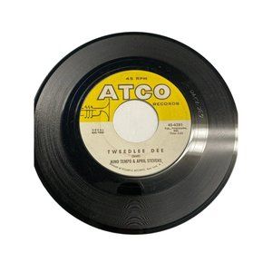 Vintage 7” vinyl record 45 RPM Nino Tempo April Stevens whispering tweedlee dee